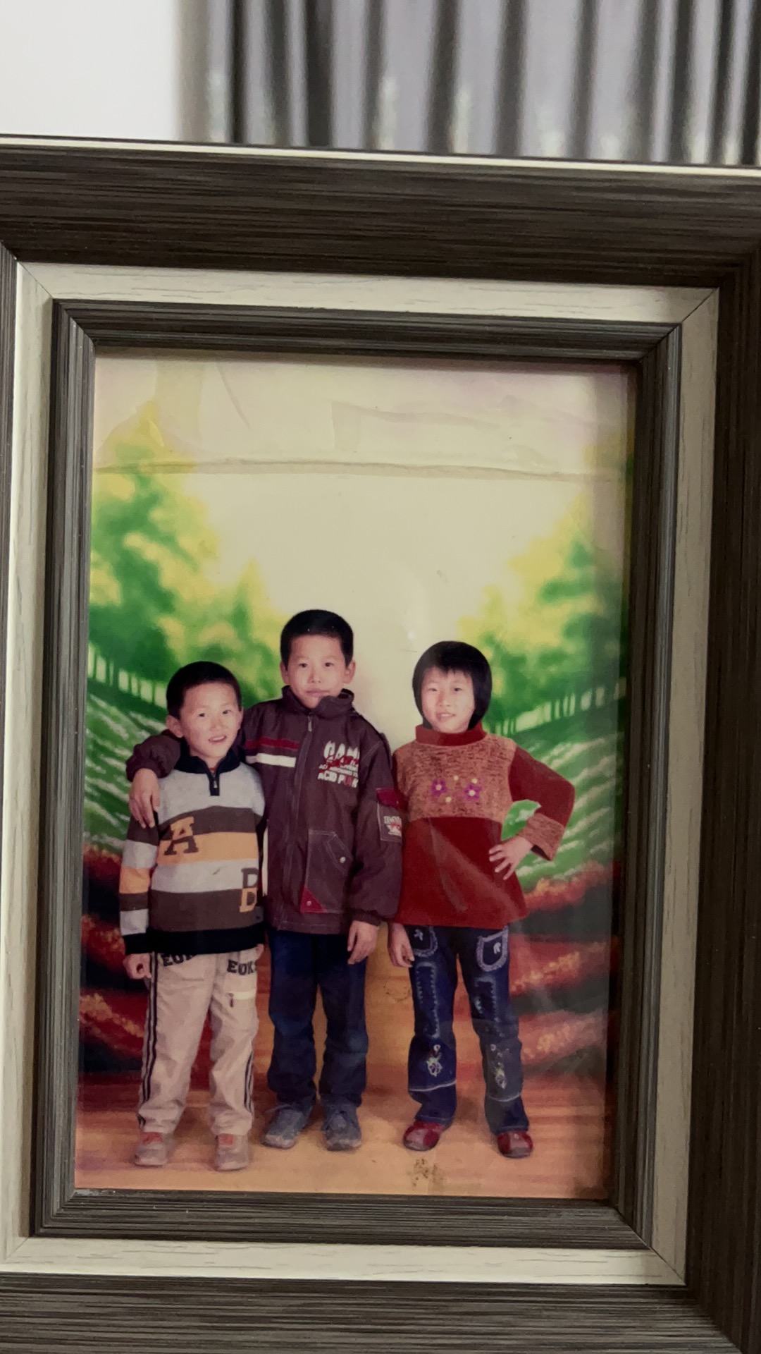 家庭合照三兄姐弟